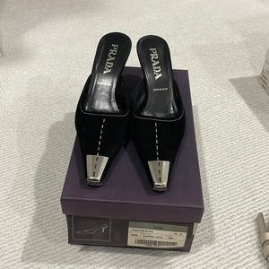 Prada. Black suede w silver metal front slides